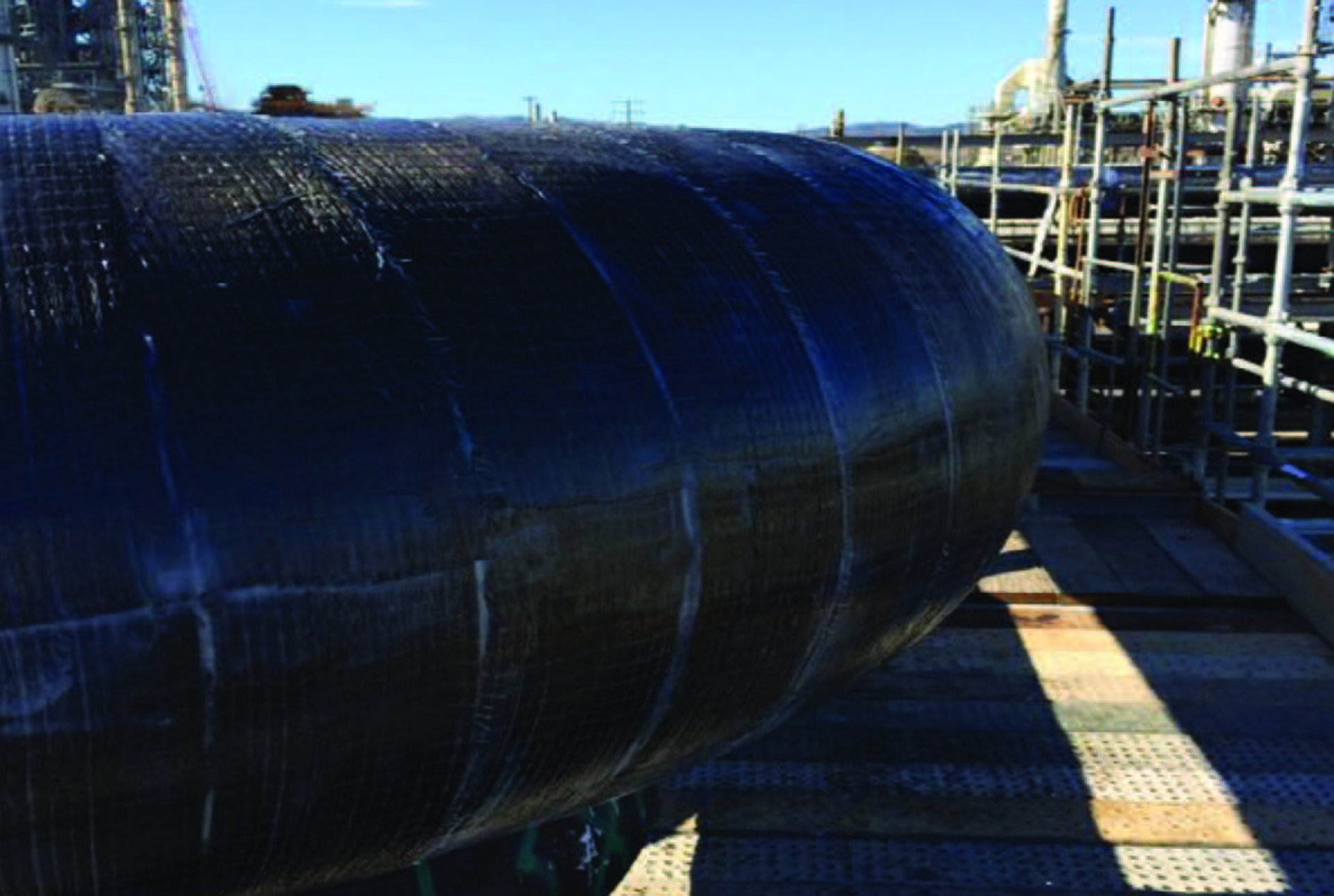 Pipe wrapped with high temperature Tyfo®