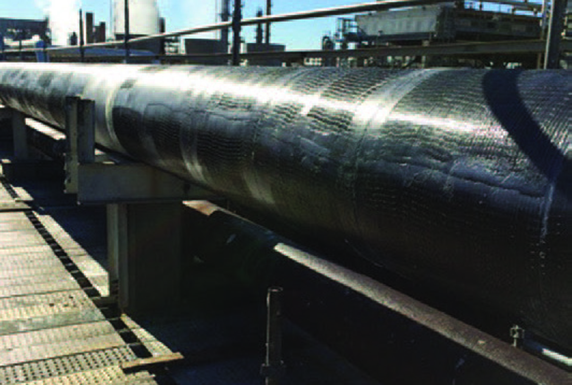 Pipe wrapped with high temperature Tyfo®