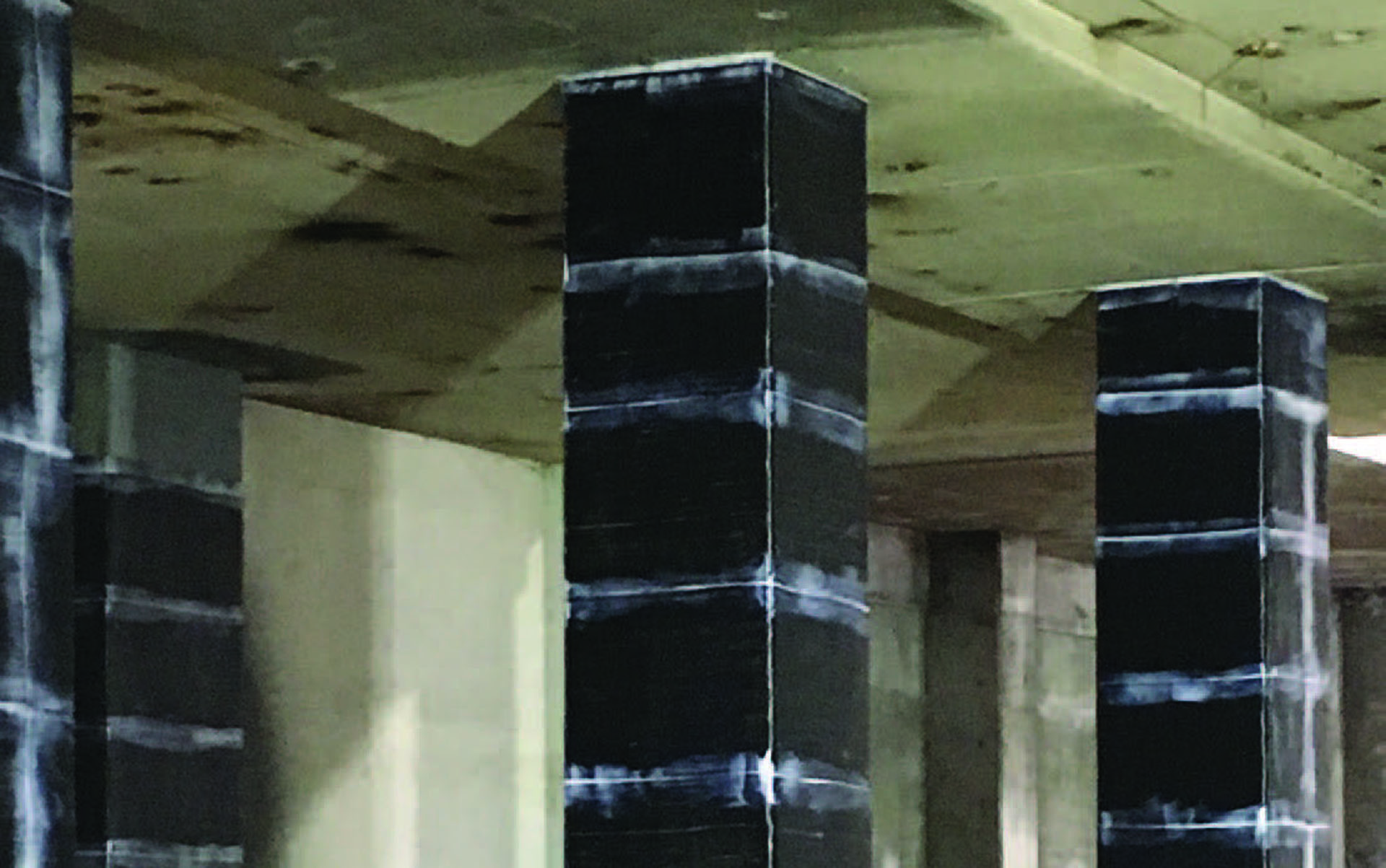 Column retrofit in lower levels of structure