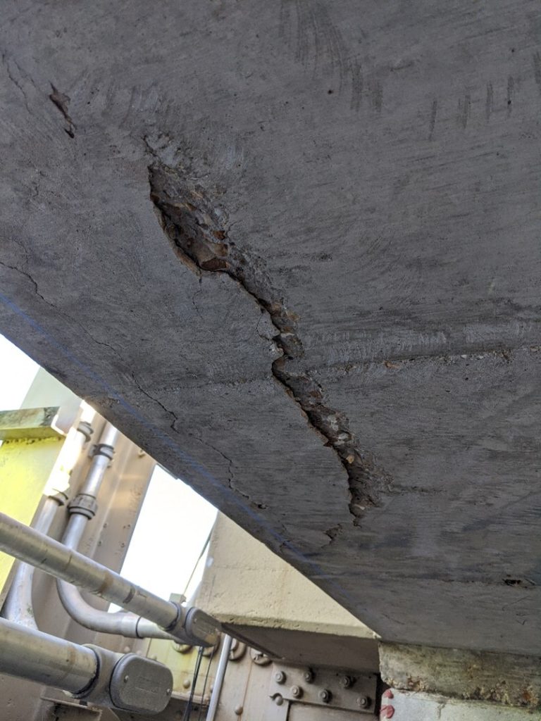 Severe spalling to the underside of the bridge